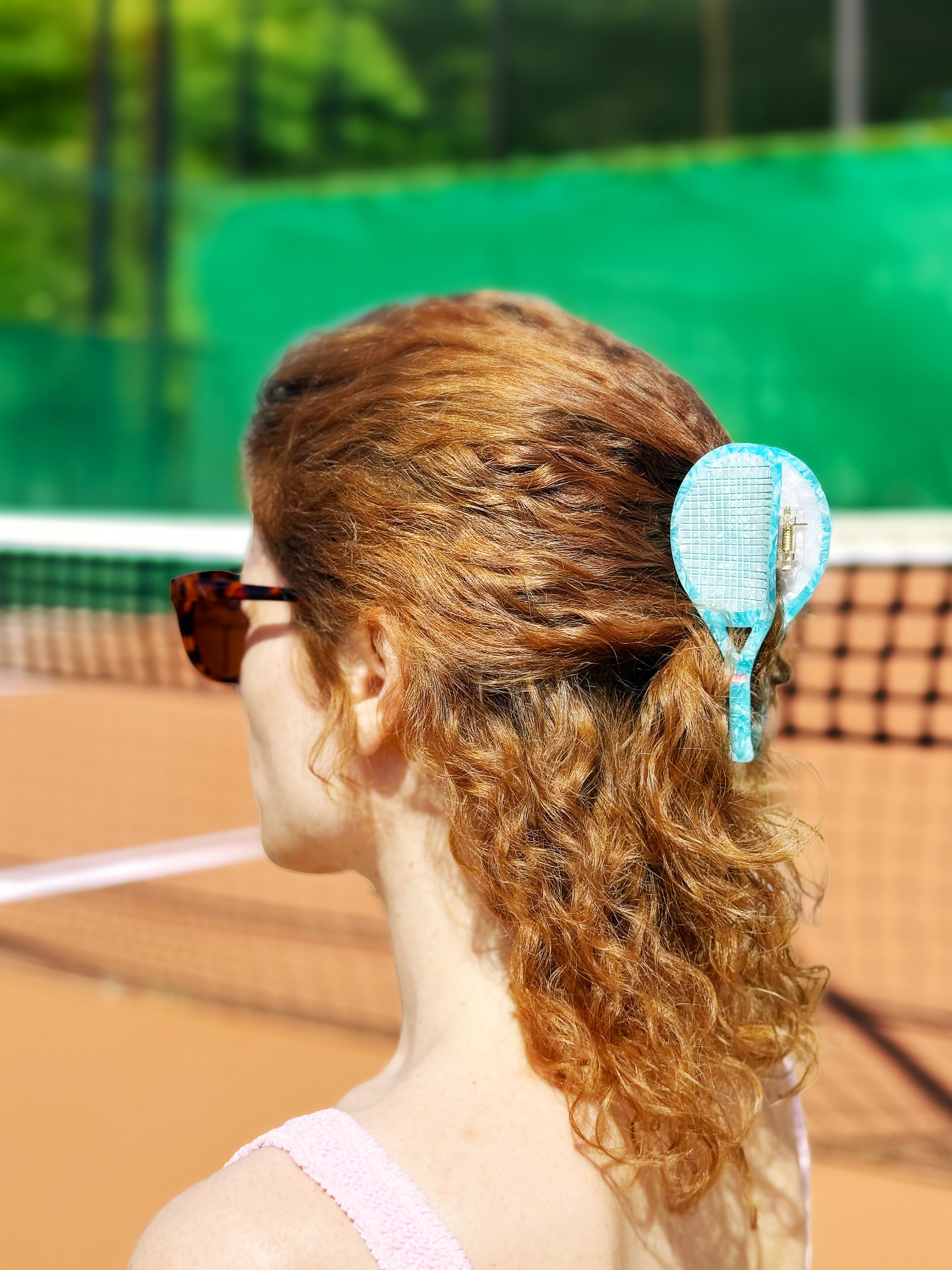 Haarklammer Tennisschläger