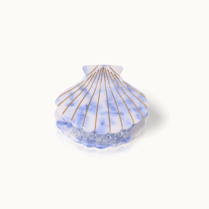Haarklammer in Muschelform in blau und weiß mit goldenen Streifen