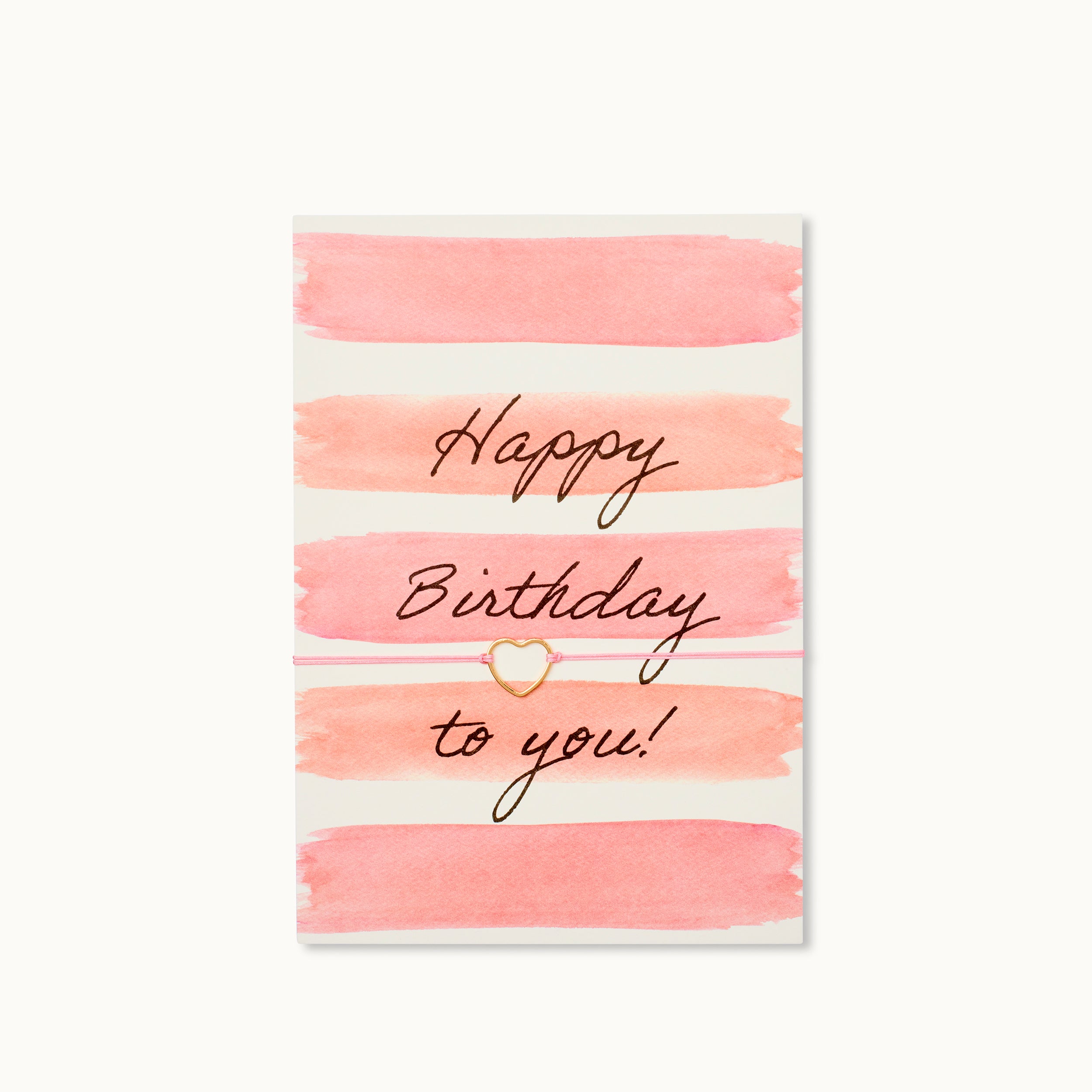 Happy Birthday to you! Karte mit einem Herz als 18K vergoldeter Anhänger an einem korallfarbenen Armband. 