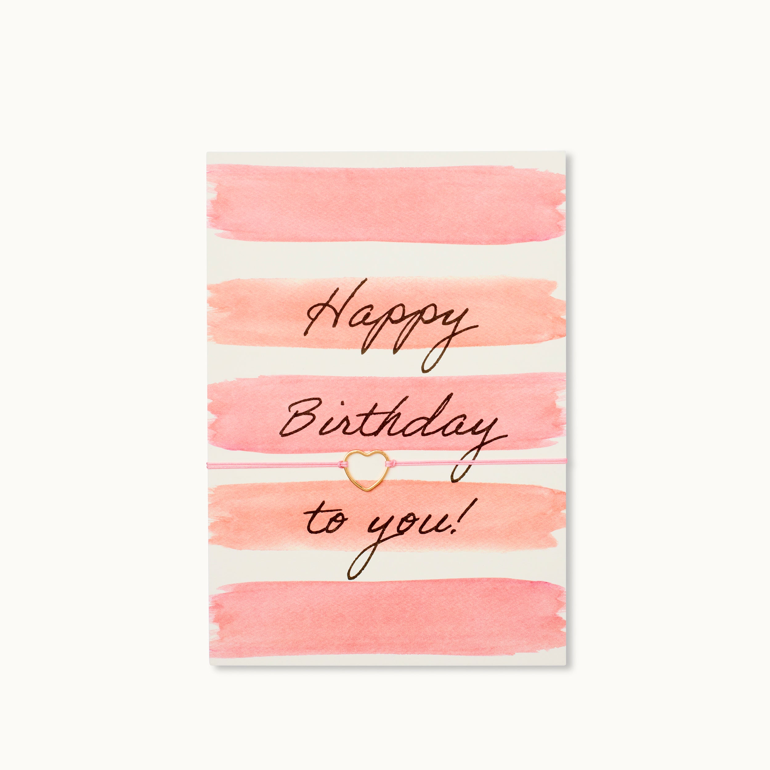 Happy Birthday to you! Karte mit einem Herz als 18K vergoldeter Anhänger an einem korallfarbenen Armband. 