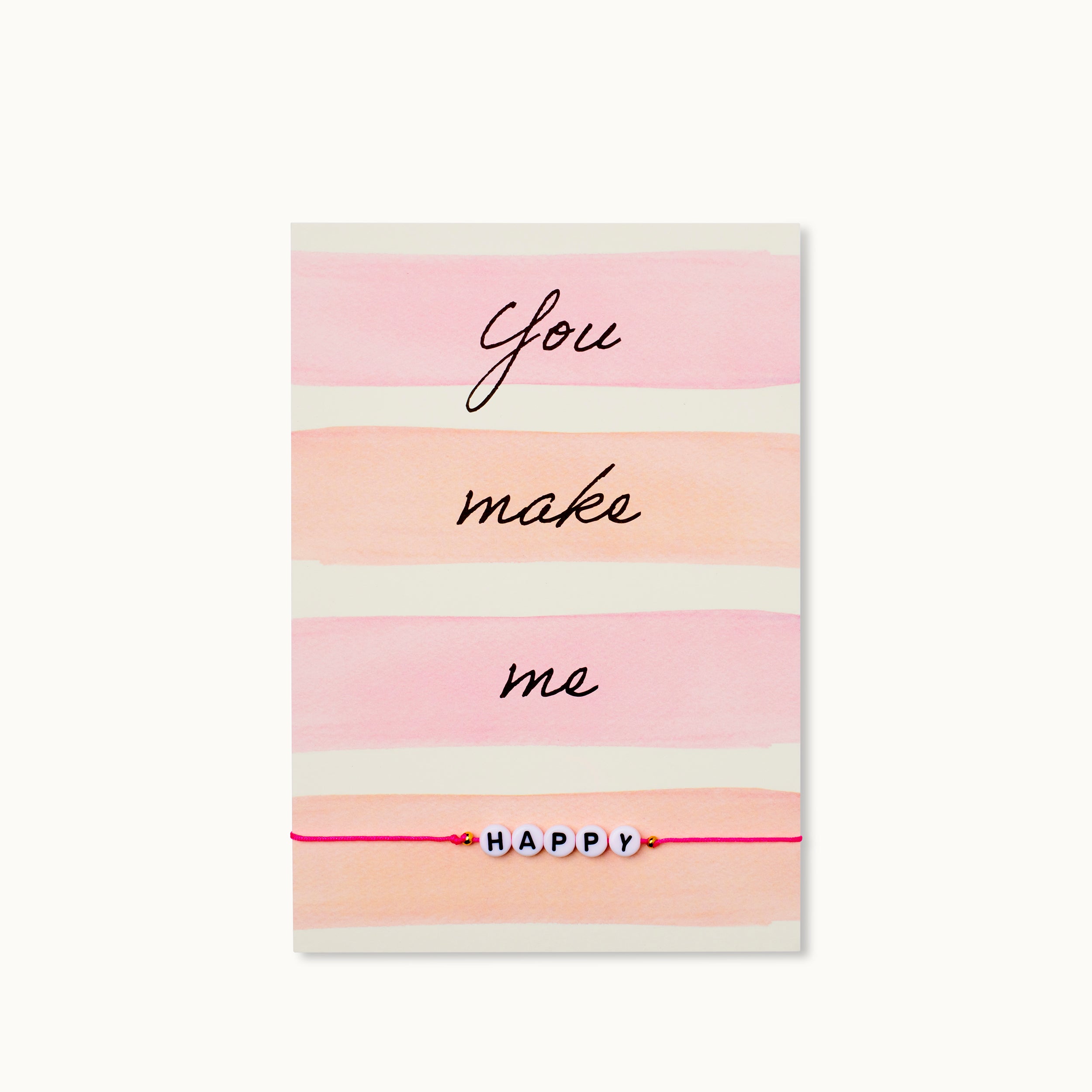 Happy! Karte mit Schriftzug HAPPY aus Acrylperlen mit zwei 18K vergoldeten Perlen an einem neonpinken Armband. 