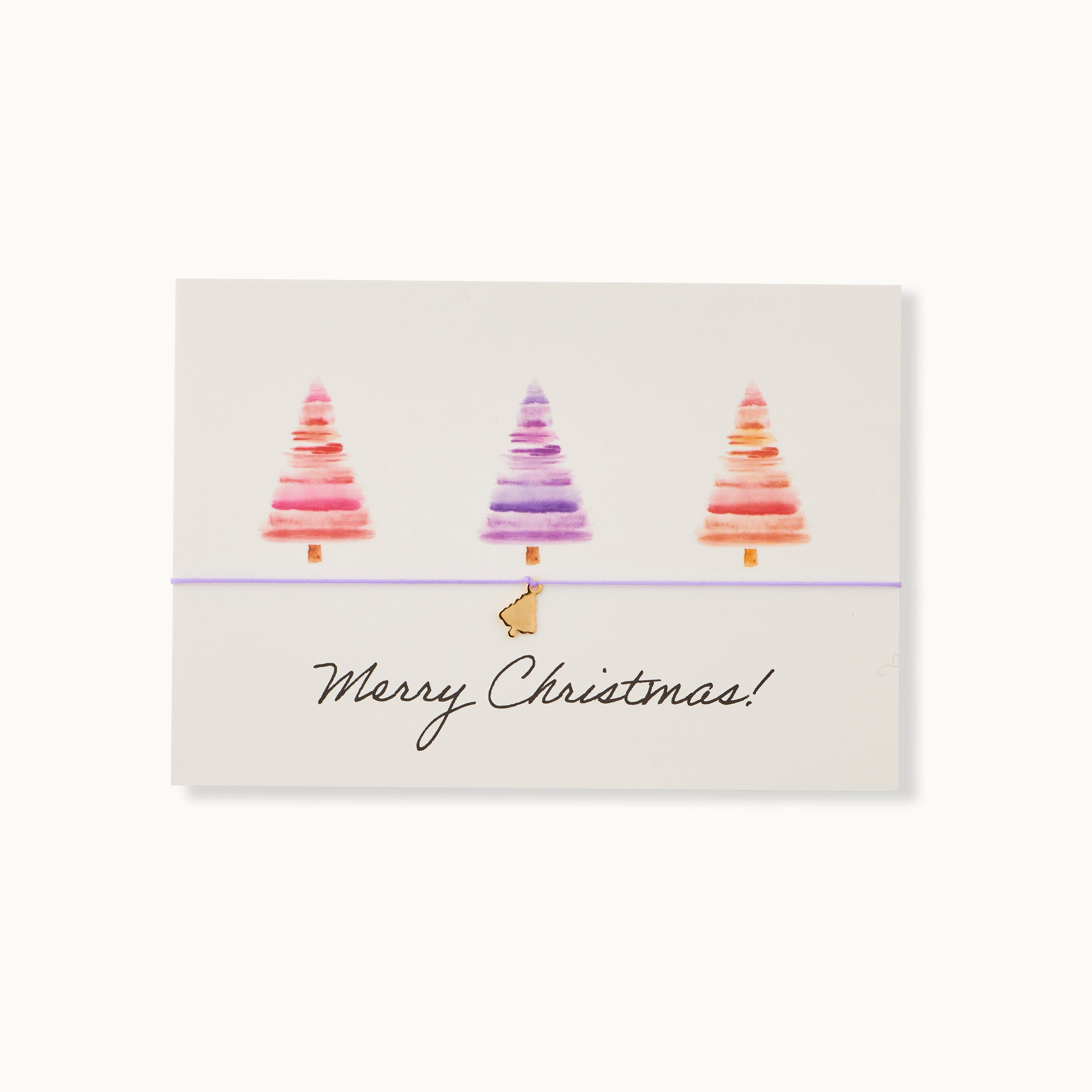 Merry Christmas! Karte mit einem Weihnachtsbaum als 18K vergoldeter Anhänger an einem dunkelgrünen Armband.